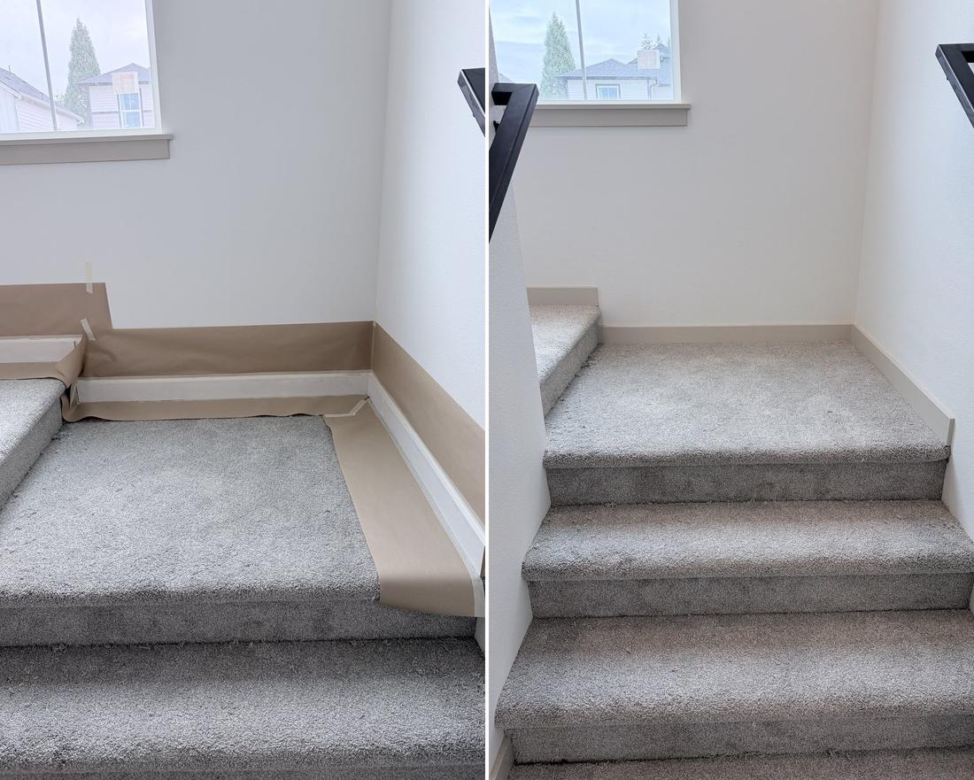 Stair landing baseboards masked off and painted — before and after